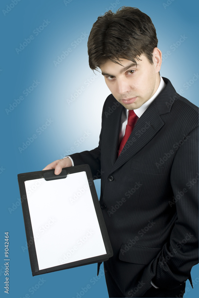 Business man in dark suit holding clipboard Business man in dark suit holding clipboard