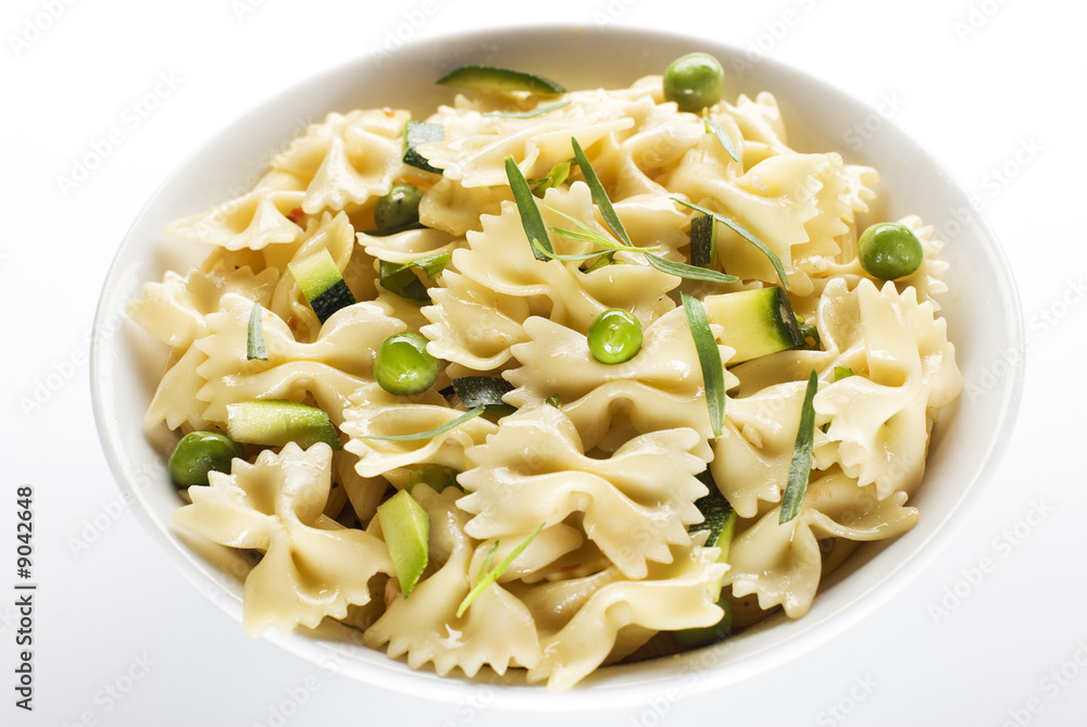 fresh pasta with peas and pumpkin isolated on white fresh pasta with peas and pumpkin isolated on white