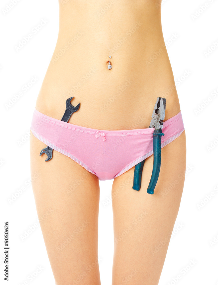 Sexy young girl in pink panties with screw key and pliers foto de Stock |  Adobe Stock
