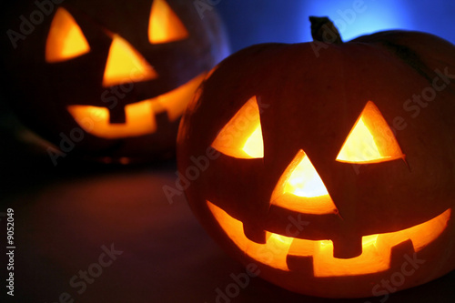 Two Halloween pumpkin with lights