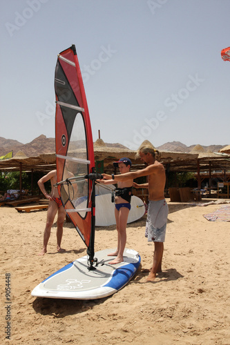 Theaching children windsurfing in Dahab.  Egypt.