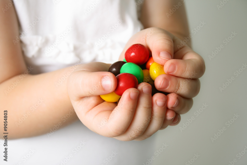 Bubble Gums in the hands of the small girl Bubble Gums in the hands of the small girl
