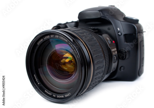 Dslr camera with zoom lens, isolated on white