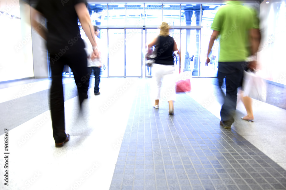 Shopping abstract. People rush motion blurred