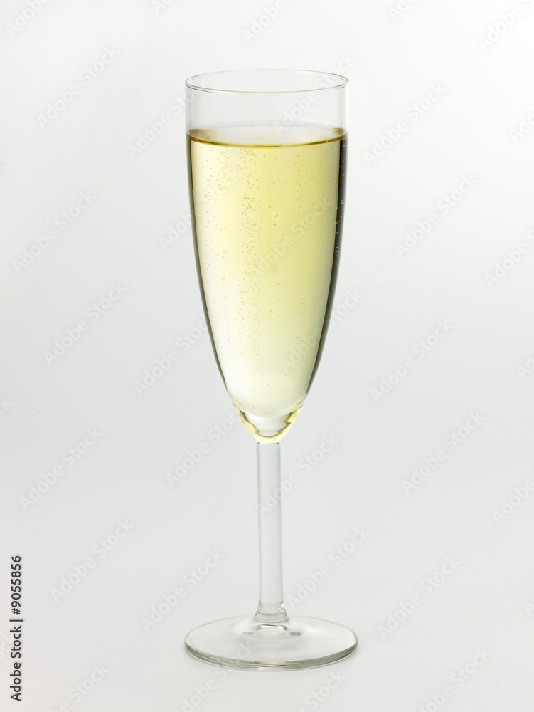 A Champagne glass with Champagne on white background A Champagne glass with Champagne on white background