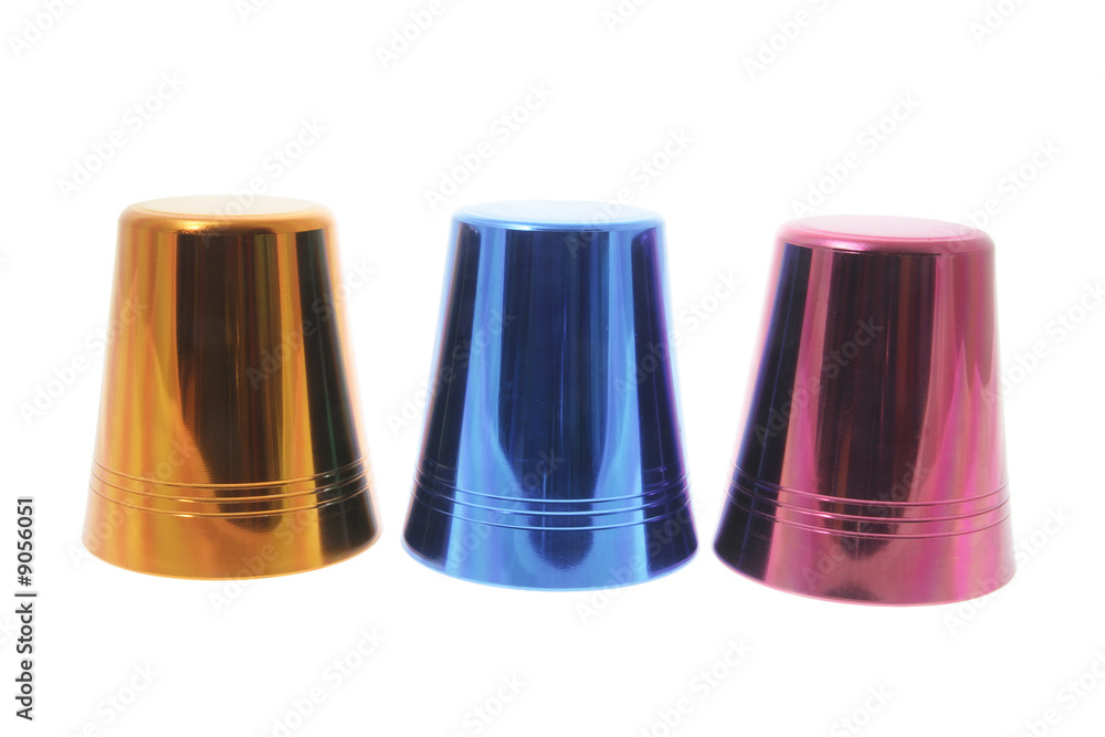 Colored Tin Cups on Isolated White Background Colored Tin Cups on Isolated White Background