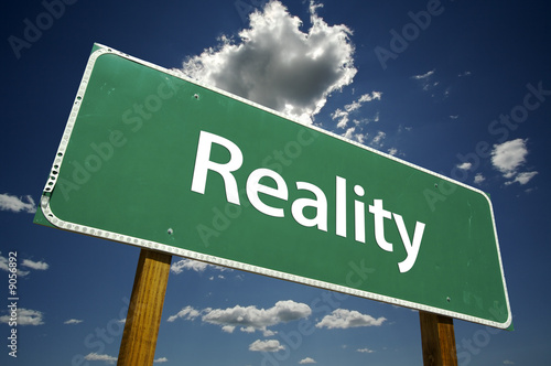 Tableau sur toile Reality Road Sign with dramatic clouds and sky.