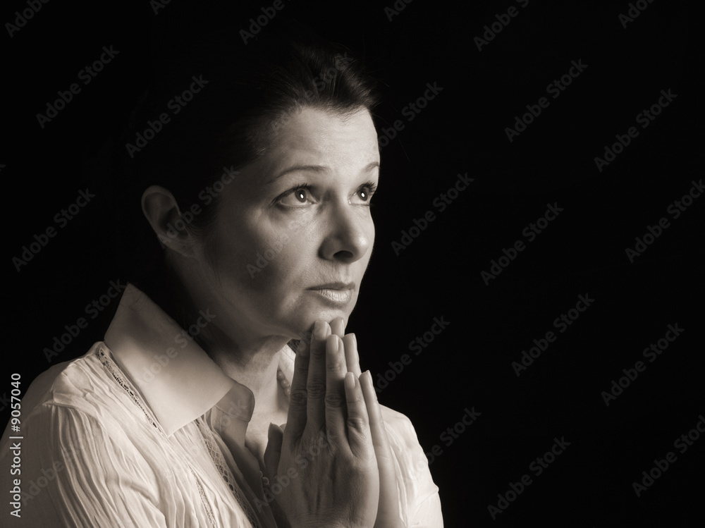 Beautiful woman gazing up to heaven in prayer Beautiful woman gazing up to heaven in prayer