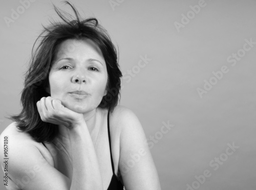 Pretty woman with a look of bemused expectation