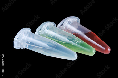 Eppendorf vials with white, red and green liquid isolated