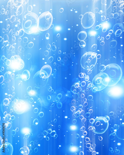 Rising air bubbles on a soft blue background