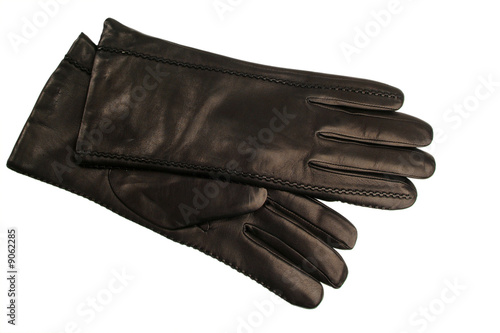 Black female glove on a white background