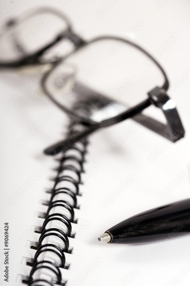 Business Team: image of glass on page with spiral Business Team: image of glass on page with spiral
