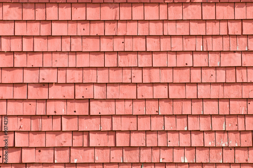 Old weathered red barn, detail of shingles