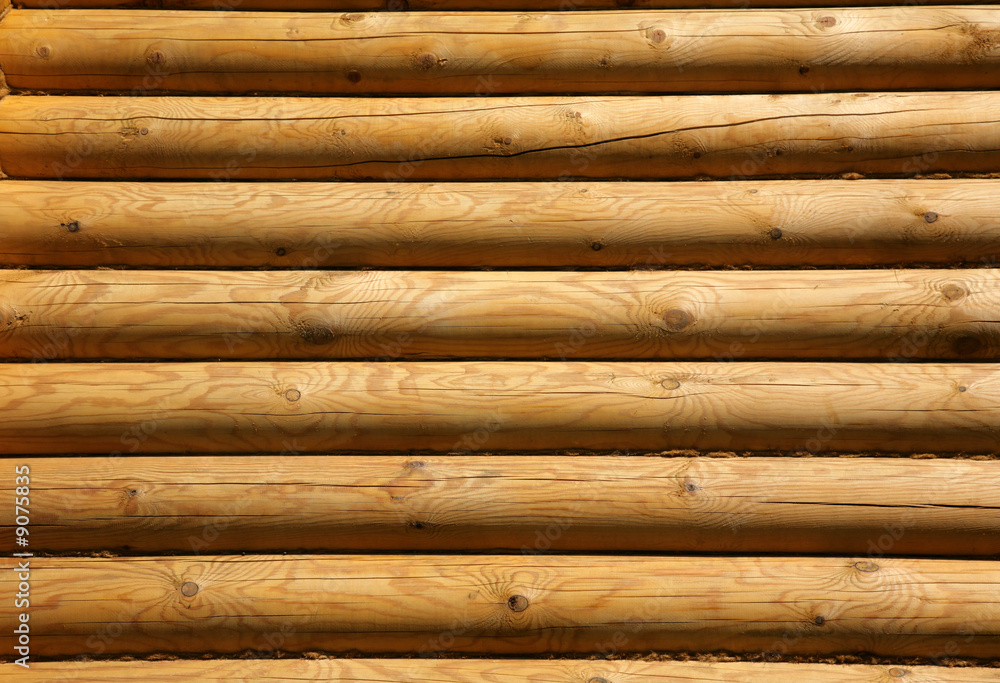 Wall of the rural house from wooden logs Wall of the rural house from wooden logs