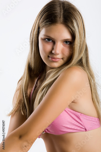 Teen age girl in a pink top