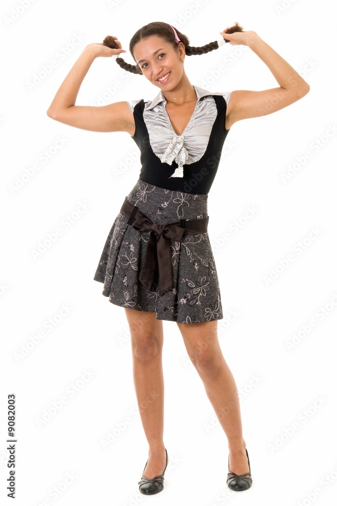 young woman with pigtails in short dress, isolated on white. young woman with pigtails in short dress, isolated on white.