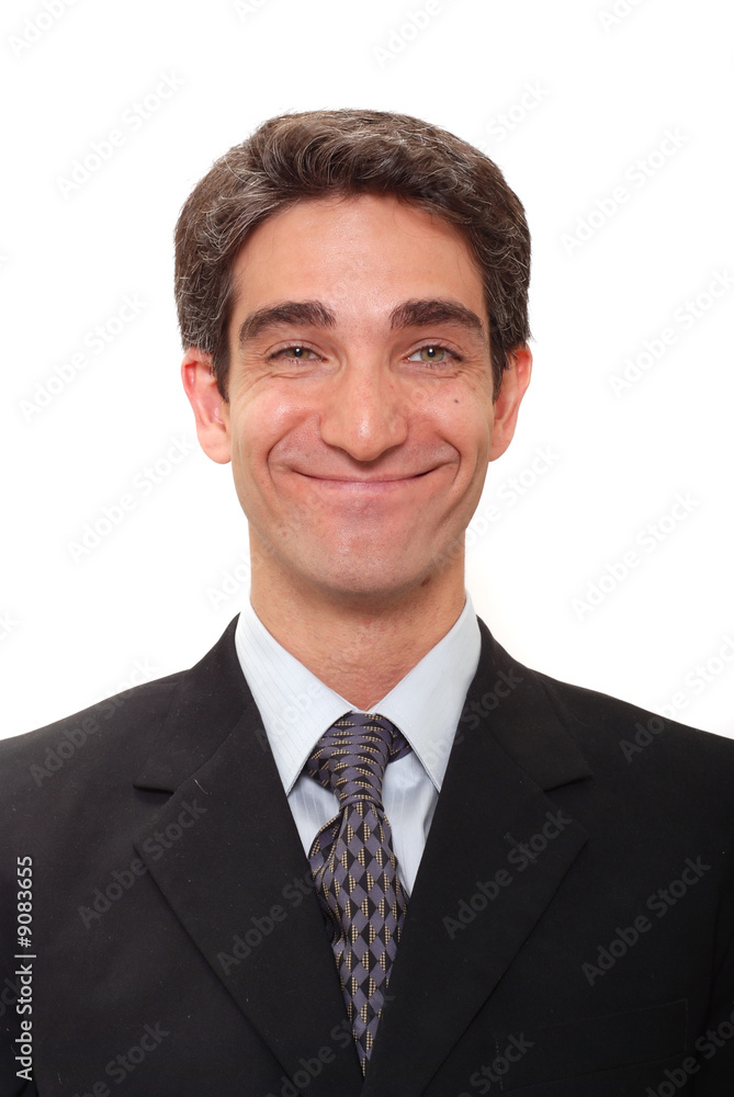 Businessman in dark suit smiling Businessman in dark suit smiling