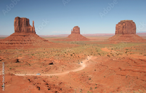 Shot of famous rocks in Monument Valley and the road. Arizona.