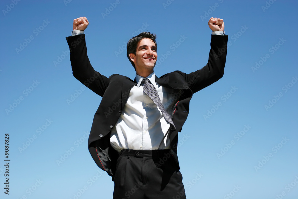 Successful businessman jumping to celebrate Successful businessman jumping to celebrate