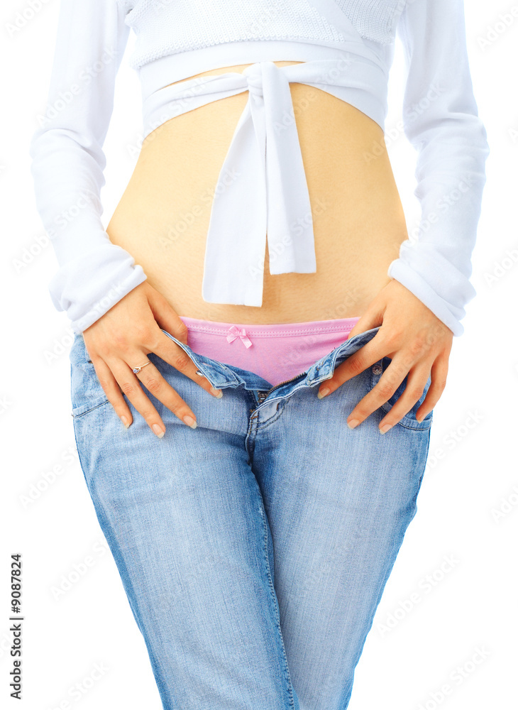 Pretty young girl in jeans and pink panties over white Stock Photo