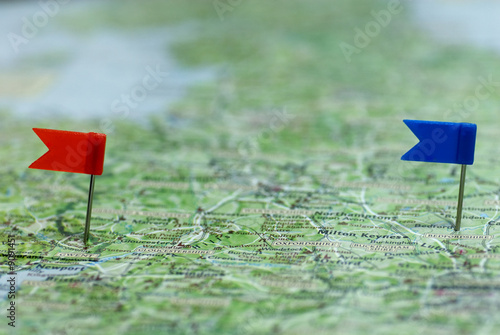 Side view of 2 flag pins show direction of two places.