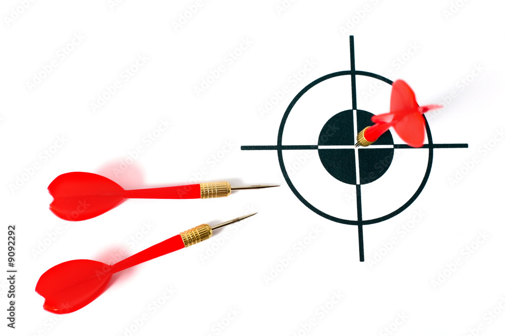 An image of tree darts and black target An image of tree darts and black target