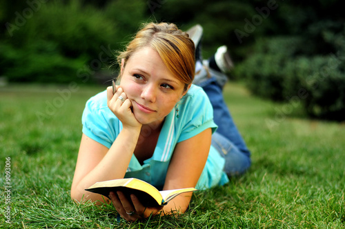 Student Reading in a public park