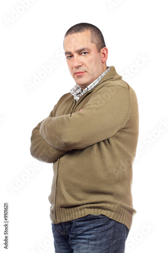 A serious casual man over white background