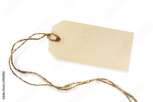 Blank tag tied with brown string. Isolated on white.