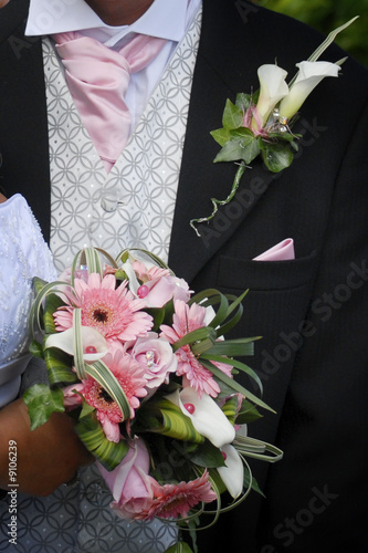 Groom with bouquet and matching buttonhole