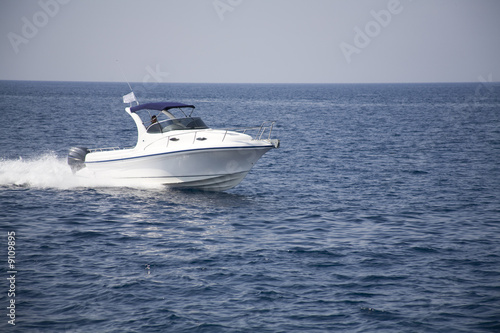 Quick speedboat runing on the sea © ambrits