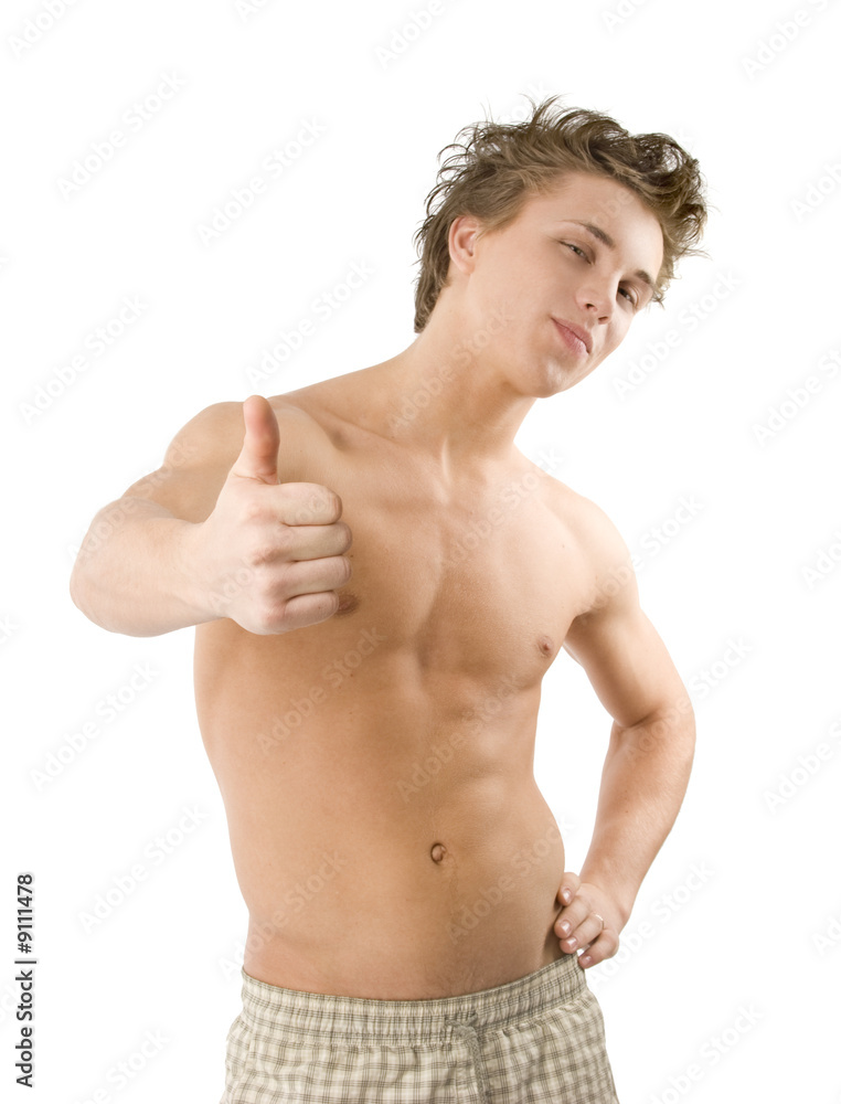 Joyful guy  with beautiful body  posing topless.