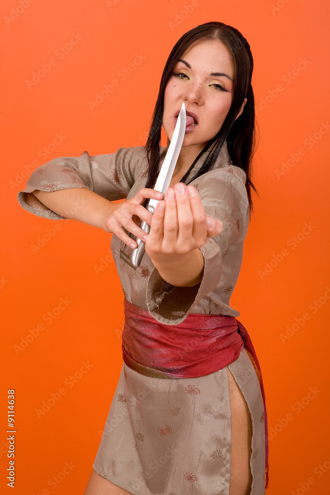 attractive brunette woman with knife attractive brunette woman with knife