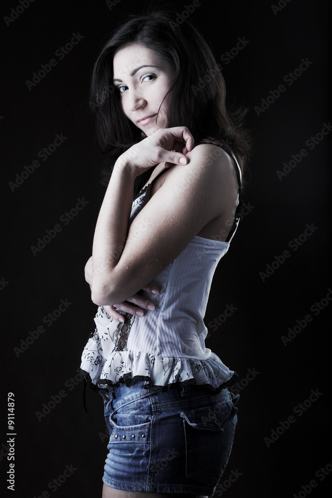 Fototapeta premium Young beautiful woman with long dark hair