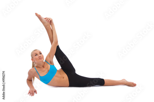 beautiful woman having fitness exercise on white