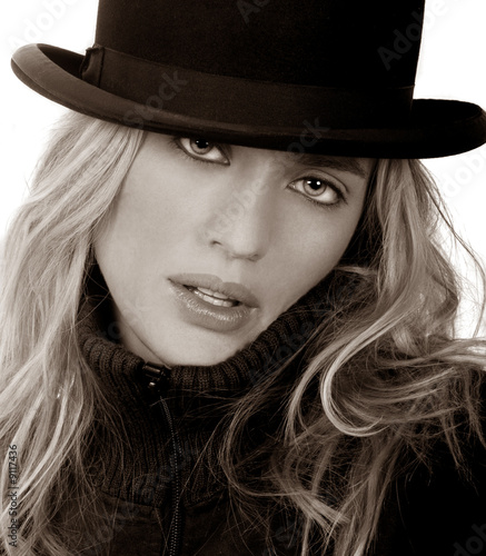 Very Sexy Blond Model with Vintage bowler hat on white © Laurin Rinder