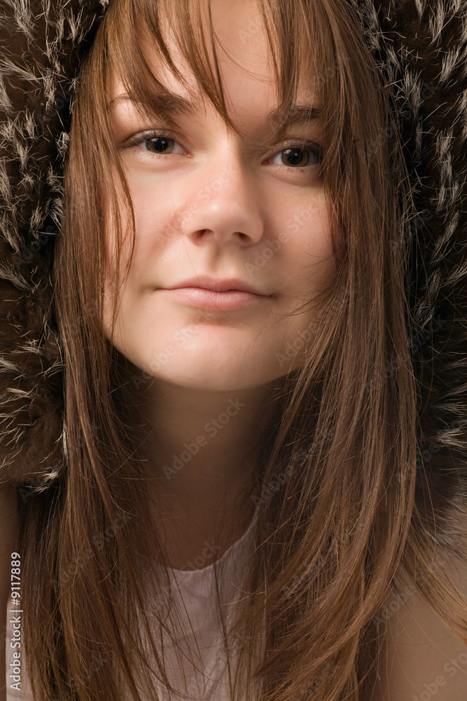 young woman in fur hat close-up portrait young woman in fur hat close-up portrait