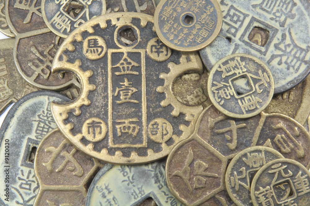 Asian Currency Used in Ancient China Laid Out in a Pile