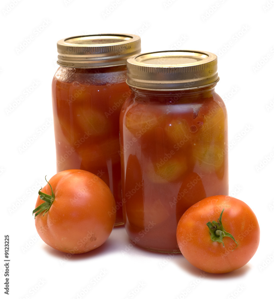 Tomatoes canned in mason jars to keep as preserves Tomatoes canned in mason jars to keep as preserves