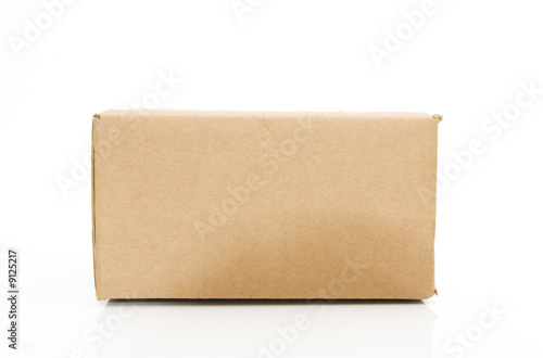 side view of a cardboard box isolated against white background © jovica antoski