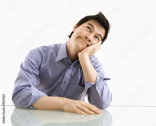 фотографія Businessman thinking and hoping.