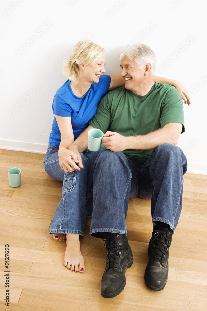 Couple enjoying coffee. Couple enjoying coffee.