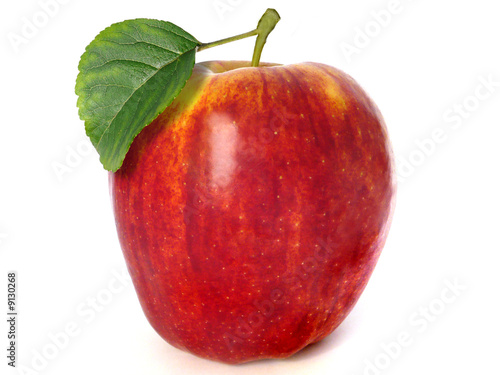 red apple with green leaf