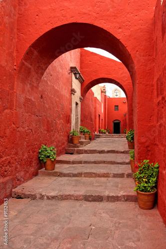 red old traditional building with arch