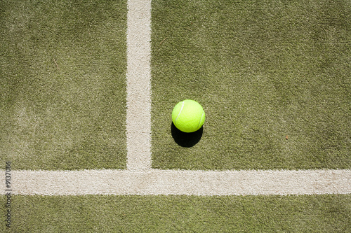 tennis ball and white lines