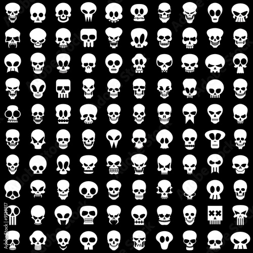 one hundred different skulls on black background