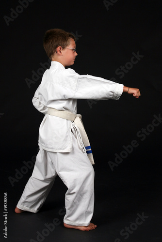 young boy demonstrating traditional karate right stance