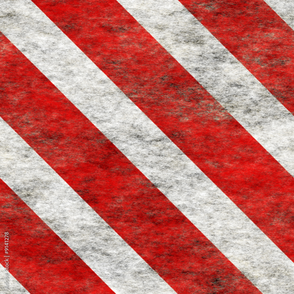 Fototapeta premium Diagonal hazard stripes texture. Weathered, worn and grungy.