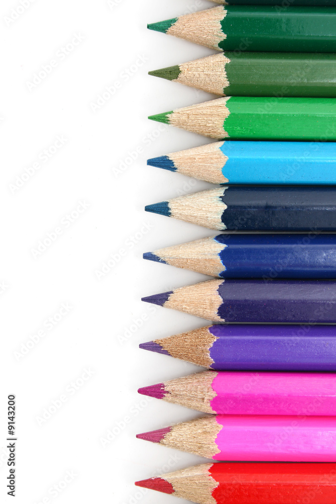 Obraz premium line of crayons on white background